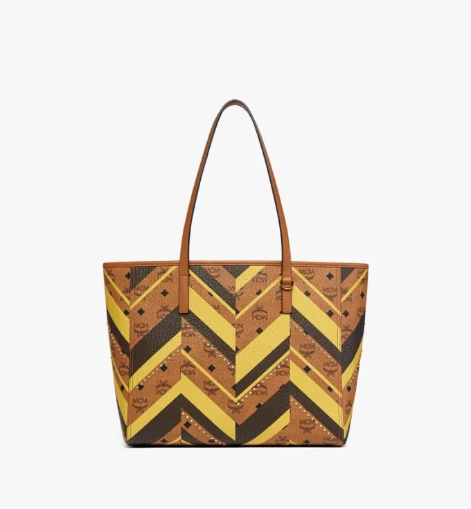 Bolso de compras Toni Shopper con cremallera superior y tachuelas en lona Visetos Mega Herringbone Bolso de compras Toni Shopper con cremallera superior y tachuelas en lona Visetos Mega Herringbone
