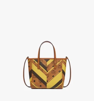 Bolso de compras Toni Shopper con cremallera superior y tachuelas en lona Visetos Mega Herringbone Bolso de compras Toni Shopper con cremallera superior y tachuelas en lona Visetos Mega Herringbone