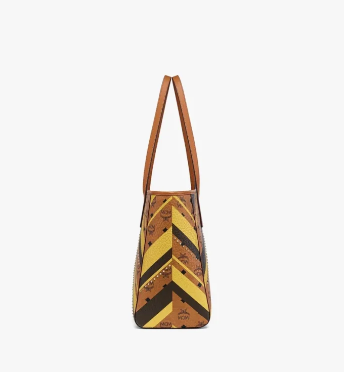 Bolso de compras Toni Shopper con cremallera superior y tachuelas en lona Visetos Mega Herringbone Bolso de compras Toni Shopper con cremallera superior y tachuelas en lona Visetos Mega Herringbone