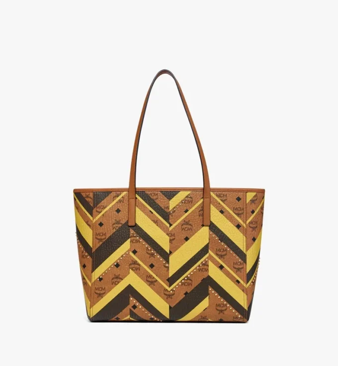 Bolso de compras Toni Shopper con cremallera superior y tachuelas en lona Visetos Mega Herringbone Bolso de compras Toni Shopper con cremallera superior y tachuelas en lona Visetos Mega Herringbone