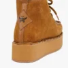 Botas de plataforma en piel de becerro