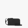 Neceser Aren en piel con monograma en relieve Neceser Aren en piel con monograma en relieve