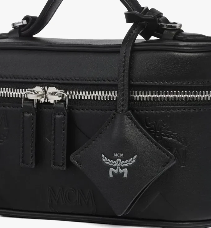Neceser Aren en piel con motivo Maxi Monogram Neceser Aren en piel con motivo Maxi Monogram
